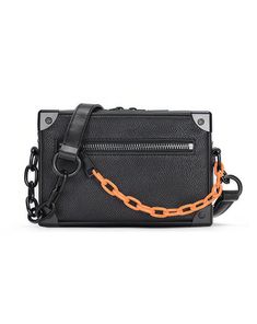 Meet your new go-to accessory: the Crossbody Box Bag with Attached Chain Detail, where style meets practicality.

Crafted with an edgy mix of textures and a thoughtfully designed pattern, this bag is made for those who appreciate a touch of moody sophistication. The exterior boasts a durable, grainy finish complemented by a bold chain detail, offering a juxtaposition of nonchalance and polish. Inside, the bag features a neatly organized compartment with a dedicated space to secure your essential Urban Wear, Box Bag, Tanzania, Uganda, Kenya, Orange Black, Vietnam, Thailand, Chain