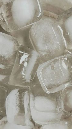 ice cubes are piled together on top of each other