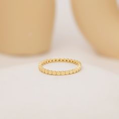 Your Dainty Dot Ring is stylish, dainty and pretty ideal for everyday use. Details of solid gold handmade Flat Bead Eternity Band are very eye-catching. It is a great gift for your loved ones. This jewelry will be an indispensable piece of yours. This meaningful Flat Bead Stacking Ring with high quality handwork will be a legacy you can leave to your family its.  * Flat Beaded Ring Details * Material / Gold Kt:  14K (585), 18K (750), 8K (333) * Available Gold Colors: Yellow Gold, White Gold, Rose Gold * Band Width: 1.75 mm * Band Thickness: 1.45 mm * The width may differ slightly due to handwork. ❗ WHEN WILL IT BE READY TO SHIP? * 14k-Yellow Gold, Rose Gold, White Gold:3-5 Business Days * 18k-Yellow Gold, Rose Gold, White Gold:3-5 Business Days * 8k-White Gold:3-5 Business Days * 8k-Yellow Yellow Gold Tiny Beads Jewelry For Wedding, Yellow Gold Tiny Beads Wedding Jewelry, Wedding Jewelry In Yellow Gold With Tiny Beads, Yellow Gold Wedding Jewelry With Tiny Beads, Gold Beaded Wedding Rings, Adjustable Round Ring With Tiny Beads, Adjustable Ring With Tiny Beads, Adjustable Rings With Tiny Beads, Minimalist Beaded Round Rings