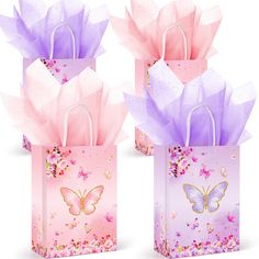 two pink and purple bags with butterflies on them