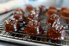 there are chocolates on the cooling rack ready to be eaten