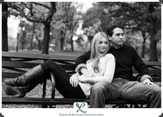 a man and woman are sitting on a bench