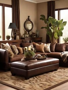 a living room filled with lots of brown furniture