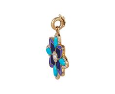 Add this vibrant Storrow charm pendant to any of your favorite chains for a touch of decadent whimsy. The 14K yellow gold violet is set with a geometric surface of turquoise, lapis and blue enamel inlay with a diamond frame. One small white pearl sits at the center surrounded by more diamonds for the perfect extra pop of sparkle. It hangs from the 14K yellow gold clasp, positioned to be a versatile addition to any chain bracelet or necklace. total length : 1 1/4"14K yellow gold charm : just unde Diamond Frame, Gold Charm, White Pearl, Pearl White, Chain Bracelet, Charm Pendant, Violet, Diamonds, Sparkle