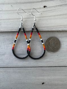 Bohemian Teardrop Earrings With Ear Wire, Bohemian Teardrop Beaded Earrings For Pierced Ears, Festival Teardrop Earrings With Ear Wire, Bohemian Black Teardrop Beaded Earrings, Black Bohemian Teardrop Dangle Earrings, Handmade Black Bohemian Teardrop Earrings, Bohemian Teardrop Beaded Earrings, Festival Teardrop Earrings, Teardrop Earrings With Ear Wire For Festival