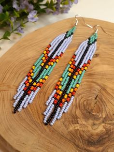 the beaded earrings are made with multicolored beads