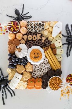 halloween treats arranged in the shape of a square