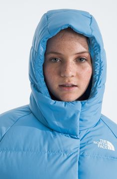 Kids will be happy to have the incredible warmth that this hooded jacket offers with 600-fill-power recycled down and a water-repellent finish. It also incorporates raglan sleeves for easy movement so they can keep moving through the snowy weather. Front zip closure with hook-and-loop storm placket Elastic binding on hood, cuffs and hem Fixed three-piece hood Secure-zip chest and hand pockets Hood is lined with Heatseeker™ Eco synthetic insulation Lined, with 600-fill-power waterfowl down 78 g/m Hooded Puffer Jacket With Drawstring For Outdoor, Blue Puffer Jacket With Detachable Hood For Outdoor Activities, The North Face Hooded Nylon Puffer Jacket, Blue Puffer Jacket With Adjustable Hood For Outdoor Activities, Blue Puffer Jacket With Adjustable Hood For Outdoor, Blue Hooded Functional Puffer Jacket, Blue Nylon Parka With Adjustable Hood, Hooded Puffer Jacket With Detachable Hood For Outdoor, The North Face Nylon Puffer Jacket With Detachable Hood