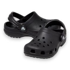 Crocs Kids' Classic Clog In Black - Size J6 Original. Versatile. Comfortable. Easy On, Easy Off! Just Like The Adult Classic, The Kids’ Version Offers Amazing Comfort And Support, Thanks To The Light, Durable Croslite Material And Molded Design. Kids Can Customize Their Crocs Clog However They Like; Ventilation Holes Accommodate Jibbitz Brand Charms. Kids' Classic Clog Details: Pivoting Heel Straps For A More Secure Fit Easy To Clean Customizable With Jibbitz Charms Iconic Crocs Comfort: Lightwe White Crocs, Black Crocs, Comfortable Shoes For Women, Sneaker Sale, Crocs Classic Clogs, Platform Clogs, Most Comfortable Shoes, Women's Crocs, Classic Kids