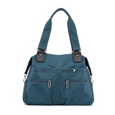 a blue handbag with two zippers on the front and one side pocket open