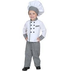 a little boy wearing a chef costume