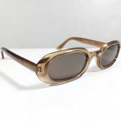 A beautiful pair of honey brown translucent Gucci GG1157/S designer sunglasses. . Brand: Gucci. . Model: GG1157/S 6CF 51-21 135. . Color: Honey brown translucent. . Lens color: Gray. . Gucci logos at arms. . Material: Made of specially designed materials to guarantee lightness, comfort and at the same time sturdiness. . Made in Italy. Condition: Pre-owned - Very good. Minimal micro-scratches on the original lenses. Structurally sturdy and sound. Please see photos. Comes in after market hard case Gucci Model, Sunglasses Brand, Honey Brown, Vintage Brown, Eyewear Sunglasses, Designer Sunglasses, Hard Case, Sunglasses Accessories, Greece