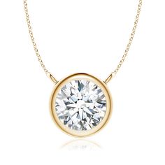 This bezel-set pendant necklace, crafted in 14k yellow gold, is a perfect mix of extravagance and simplicity. The solitaire diamond pendant is attached to the chain by the loops. Cut in a classic round shape, the diamond shines with unmatched brilliance. Choose from different stone qualities (K, I3, I-J, I1-I2, H, SI2, GH VS) and multiple total carat weight options. Classic Diamond Necklace With Smooth Bezel, Anniversary Diamond Necklace With Round Bezel Pendant, Anniversary Diamond Necklace With Bezel Setting And Round Pendant, Classic Pendant Diamond Necklace With Bezel Setting, Classic Diamond Necklace With Smooth Bezel For Anniversary, Classic Round Necklace With Smooth Bezel, Classic Round Cut Diamond Necklace With Smooth Bezel, Classic Gold Solitaire Necklace With Smooth Bezel, Classic Round Diamond Necklace With Smooth Bezel