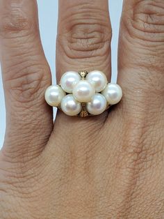 You are viewing a beautiful 14k solid gold vintage pearl ring. The ring tested 14k ..its actually a ming's ring got resized and erased the marked..selling it as is...the ring is in good condition. The total gram weigh of the ring is approx.7.84 grams. The ring size is approx.size 6 can size up or down. Its a beautiful ring. If you have a question send me a message. White 14k Oval Pearl Ring, Fine Jewelry White Pearl Ring Stamped 14k, White Pearl Ring Stamped 14k, Vintage Yellow Gold Pearl Ring, White 14k Stamped Pearl Ring For Wedding, White Round Pearl Ring Stamped 14k, White 14k Stamped Pearl Wedding Ring, Antique 14k Gold Pearl Ring For Anniversary, 14k Gold Pearl Ring Stamped 14k