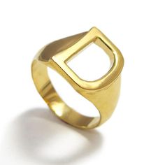 Personalize your jewelry with the initial D ring in 24k gold plating, pick your own initial or dedicate this gold letter ring to a loved one. The personalized initial ring makes fantastic friendship ring, a sweet present from a boyfriend to his other half or simply an elegant way to carry your children's initials with you at all time. #jonjonjewel #initialring #letterring #namering #signetinitialring Modern Yellow Gold Hallmarked Initial Ring, Modern Hallmarked Yellow Gold Initial Ring, Modern Gold Rings With Initials, Modern 14k Gold Rings With Initials, Modern Gold Ring With Initials, Gold Modern Engraved Ring With Initials, Modern Gold Initial Ring, Yellow Gold Monogram Ring, Modern Yellow Gold Initial Ring With Monogram