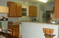 the kitchen is clean and ready to be used for cooking or dining room furniture,