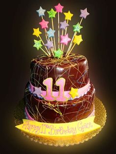 a chocolate birthday cake with stars on top