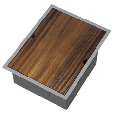 a square wooden box with metal trim