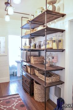 the shelves in the kitchen are filled with items