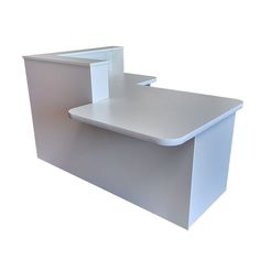 a white counter with two shelves on each side