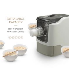 an extra large capacity juicer is shown with bowls and chopsticks