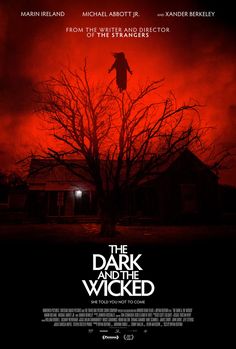 the dark knight is wiked movie poster with red sky and tree in foreground