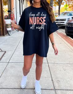 ABOUT OUR Nurse Shirt: PRODUCTION TIME: 1-3 days (Usually 2 days) SHIPPING TIME: 2-5 days (Usually 3 days) PRODUCT DESCRIPTION: Bella Canvas Unisex T-shirt Super soft cotton and excellent quality print makes. 100% Soft cotton (fibre content may vary for different colors) Light fabric (4.2 oz/yd² (142 g/m Runs true to size Our Relaxed Fit Tee (Bella + Canvas style 3001) is a unisex style that runs a touch small for men, and about a half a size large for women. It's a relaxed fit and is soft and c Black Short Sleeve Sleep Top, Graphic Print Sleep Tops With Crew Neck, Crew Neck Sleep Top With Graphic Print, Graphic Print Crew Neck Top For Sleep, Black Short Sleeve Sleep T-shirt, Short Sleeve Letter Print Sleep Top, Short Sleeve Sleep Top With Letter Print, Short Sleeve Tops With Letter Print For Sleep, Black Cotton Sleep T-shirt