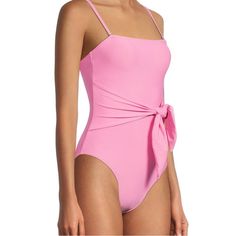 Weworewhat Capri One Piece Swimsuit In Bubblegum Pink New With Tags! Description A Fresh Iteration Of A Classic Bandeau Shape, Featuring A Chic, Waist-Slimming Sash Tied From Just One Side Seam, Elongating High-Cut Legs And A Subtly Ruched Sweetheart Neckline. Modern Yet Timeless, Removable Cups And New Seamed Edging Offer Versatility When It Comes To Support And Coverage. Bandeau Silhouette Sweetheart Neckline Removable Cups Functional Sash Ties At Waist High-Cut Leg Center Ruching 85% Nylon 15 Trendy Pink High Waist Swimwear, Casual Pink Bodysuit For Swimming, Casual High Waist Pink Swimwear, Pink Spring Bodysuit, Casual Pink Bodysuit For Summer, Pink Bodysuit For Pool In Spring, Chic Pink Bodysuit For Pool, Casual Pink Bodysuit For Poolside, Chic Pink One-piece Bodysuit