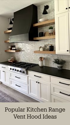 a kitchen with white cabinets and black counter tops is featured in the article popular kitchen range vent hood ideas