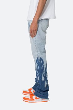 the B556 Flame Flare Denim are designed with our new B fit, which is slim through the thigh and features a slight flare at the leg opening and is constructed from light washed blue denim, panelling at the inseam and outseam from contrasting blue denim for a slight flare and finished with contrasting self fabric flame p Urban Flare Jeans With Frayed Hem, Urban Style Medium Wash Rigid Denim Flare Jeans, Urban Flare Jeans In Medium Wash Rigid Denim, Urban Denim Blue Flare Jeans In Rigid Denim, Streetwear Medium Wash Flare Denim Jeans, Dark Wash Flare Jeans For Streetwear, Medium Wash Denim Flare Jeans For Streetwear, Blue Jeans With Frayed Hem For Streetwear, Fitted Faded Jeans In Rigid Denim