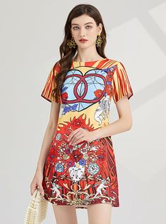 Carnival of Hue: This vibrant, stained glass-inspired dress is a wearable piece of art, flaunting a bold palette of red, yellow, and blue, intermingled with striking patterns that catch the eye. The short-sleeve design, coupled with the A-line silhouette, offers a casual yet flattering fit that moves with grace and ease. It's a piece that celebrates color and creativity, making it a perfect choice for those who love to stand out in a crowd. The kaleidoscopic patterns are not just visually compel Red Abstract Print Summer Dress, Fitted Multicolor Print Dress With Short Sleeves, Colorful Pattern Short Sleeve Summer Dresses, Red Bold Print Summer Dress, Red Summer Dress With Bold Print, Red Summer Dress With Colorful Pattern, Colorful Patterned Red Summer Dress, Yellow Short Sleeve Mini Dress, Red Dress With Bold Print For Summer