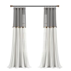 two white and grey curtains hanging from a metal rod