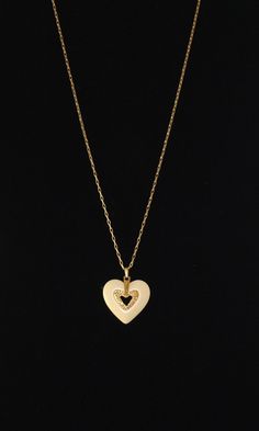 "This pretty little vintage heart necklace is a mini version of our Lanvin-like larger necklaces. Great Mother-Daughter necklaces! There are matching earrings in our Etsy store, also. Check out our other vintage designs along this line in our shop! Measures approximately 1\" in height." Vintage Heart Necklace For Mother's Day, Retro Heart-shaped Jewelry Gift, Retro Heart-shaped Necklace For Gift, Retro Heart-shaped Necklace Gift, Vintage White Heart Pendant Jewelry, Vintage White Heart-shaped Jewelry, Vintage Necklaces For Valentine's Day Anniversary, Vintage White Necklace For Valentine's Day, Classic White Heart Pendant Necklace