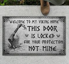 a sign that says, welcome to my viking home this door is locked for your protection not mine