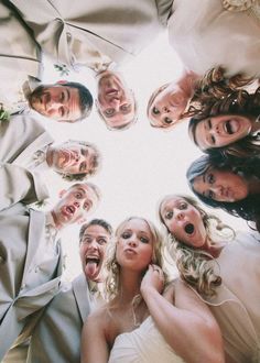 a group of people that are standing in the middle of a circle with their mouths open