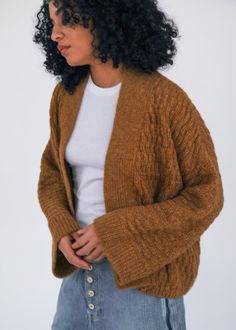 A hand-loomed kimono jacket with a box cut, complete with a belt. This is a favored shape in new weaves and colors for this fall/winter season. Hand knit in Peru for us using 70% baby alpaca, 7% merino, 23% recycled polyamide. We believe in Fair Trade and give priority to natural organic ecological materials produced in Peru under strict quality control guidelines respecting the environment. Vintage Indigo, Silk Shawl, Cozy Fits, Kimono Jacket, Baby Alpaca, Natural Organic, Quality Control, Cotton Silk, Winter Season