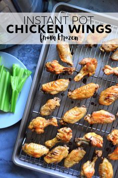 chicken wings cooking on a grill with celery sticks and green beans in the background