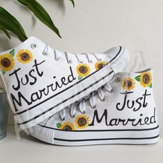 sunflowers painted on white shoes with just married written on them