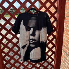 This Pimatee T-Shirt Is A Rare Find For Anyone Who Is A Fan Of Lady Gaga's Iconic 2010 Era. Great Condition! Its Unique Design And Rarity Make It A Must-Have Addition To Any Wardrobe. Happy To Answer Any Questions! Lady Gaga 2010, Rarity, Lady Gaga, A Fan, Black Gray, Make It, Must Haves, Unique Design, Black And Grey