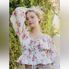 So Femme And Floral, This Timeless Blouse Is Featured In A Romantic Silhouette With Exaggerated Sleeves And Front Tie Feature For Added Dimension. Ruffled Bottom Hem Elastic Waistline Hand Wash Cold Or Dry Clean Measurements For Size M Runs Big Will Fit A L/Xl Sleeve Length: 25” Bust: 42” Waist:31” Relaxed Length: 21” Contents 100% Cotton Cottagecore Fashion Aesthetic, White Eyelet Blouse, Breezy Outfit, Cottagecore Clothes, Sale Clothes, Exaggerated Sleeves, Cottagecore Outfits, Sale Clothing, Cottagecore Fashion