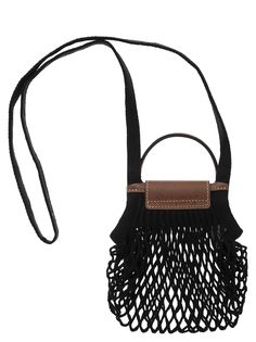 a small black purse with fringes hanging from it's side and a brown leather handle