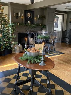 a dining room table with christmas decorations on it