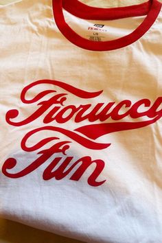 🖤 Have fun making a statement in this playful and eco-friendly Fiorucci Brand t-shirt. The white color with red trim perfectly complements the bold "Fiorucci Fun" logo. Made of 100% cotton, this shirt is comfortable, breathable, and versatile for both men and women. (Available for him and her!) 🖤 Item Features: Fiorucci Fun; White, red trim, red printed letter logo detail, round neckline, short sleeve, relaxed fit, unlined, stretchy, not see through, casual, comfy, breathable, eco, 100% cotton Fun Logo, Men Mode, Cool Logo, Letter Logo, Print Logo, Logo T Shirt, Wholesale Clothing, Tshirt Logo, Branded T Shirts