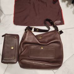 Brown Leather Coach Purse And Wallet, Never Used, Nwot, Has Small Indent (Seen In 3rd Photo) Make An Offer Or Bundle To Save Designer Wallets For Everyday Use, Designer Travel Bifold Bag, Designer Wallet With Removable Pouch For Everyday Use, Coach Wallets With Removable Pouch For Formal Use, Elegant Brown Bag With Coin Pocket, Formal Coach Wallet With Removable Pouch, Formal Bags With Coin Pocket, Coach Designer Wallets For Everyday Use, Designer Coach Wallets For Everyday Use