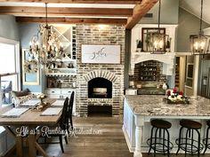 a kitchen with an oven, table and chairs