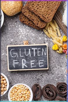 the gluten free sign is surrounded by bread, cereal and other foods that are on display