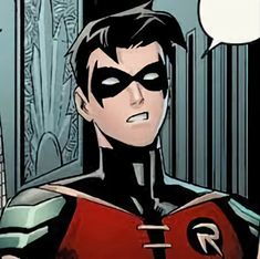 a comic character wearing a red and black costume