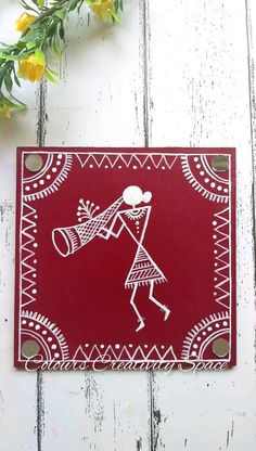 a red and white plaque with an image of a woman holding a bell on it