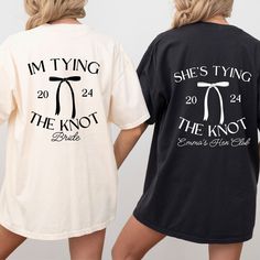 two women wearing matching tshirts with the words, i'm tying and the knot