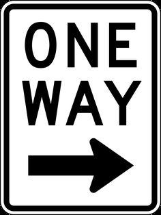 a one way sign with an arrow pointing to the right on a concrete wall background